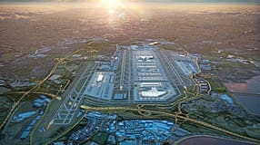 Blick von oben auf den Airport Heathrow mit dritter Bahn bei Sonnenaufgang