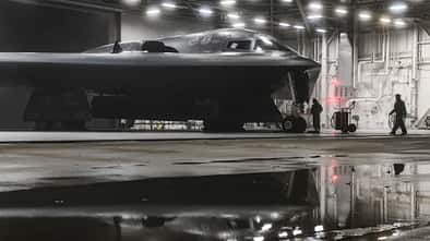 A B-2 Spirit Stealth and 393rd Aircraft Maintenance Squadron crew chiefs prepares for a training sortie