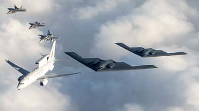 Zwei B-2 in Formation mit australischer E-7 und Kampfjets
