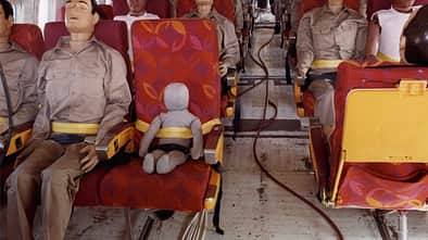 Controlled Impact Demonstration instrumented test dummies installed in plane