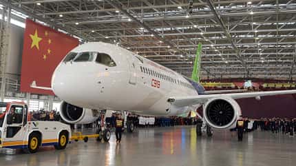 C919 Passenger Jet,COMAC,Commercial Aircraft Corporation of China Ltd,First,People Celebrate,Rolling Off People Celebrate The Rolling Off Of The First C919 Passenger Jet Plane In China