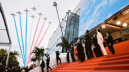775814312 Patrouille de France paid tribute to Tom Cruise by flying over the red carpet before the Official Selection Premiere at 75th Annual Cannes Film Festival