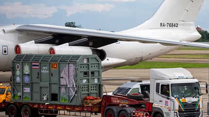 Iljuschin, Elefant, Il76, Aviacon Zitotrans A driver is seen as they move the flight cage carrying an