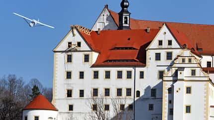 Krieg,Politik,XGV2011,XGV2011 Colditz gilder flies from castle roof