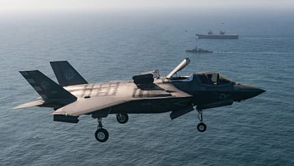 Fighter jets join forces with British aircraft carrier to make history