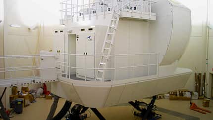 CAE baut einen Simulator für die deutsch-französische C-130J-Einheit in Evreux.