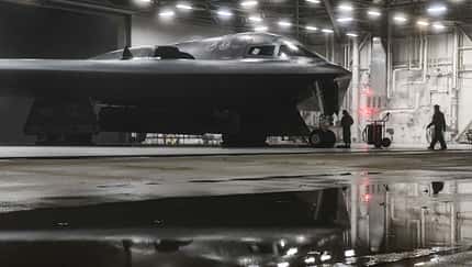 A B-2 Spirit Stealth and 393rd Aircraft Maintenance Squadron crew chiefs prepares for a training sortie