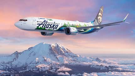 majestic view of Mount Rainier above clouds