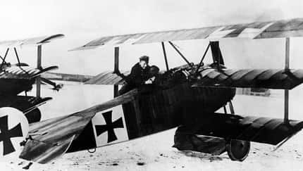 Manfred von Richthofen - Aviator, Germany - Richthofen and his airplane (Fokker triplane) DR-1) during WWI - 1918