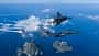 Zwei F-15K-Kampfflugzeuge der südkoreanischen Luftwaffe fliegen über die Insel Dokdo.