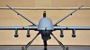 Ein MQ-9 Reaper der 62. Expeditionsaufklärungsstaffel, bewaffnet mit vier GBU-38 Joint Direct Attack Munition auf dem Flugplatz Kandahar.