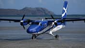 Landung am Strand von Barra mit der Twin Otter von Loganair. 